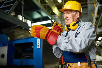Factory Foreman Speaking by Radio Set