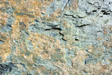 Colorful amphibolite rock closeup texture