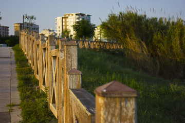 Wooden railing in the park in Antalya Turkey