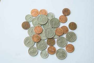 American coins on white background.