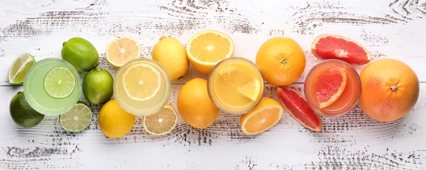 Foto auf Acrylglas Citrus and lemon juice © Li Ding