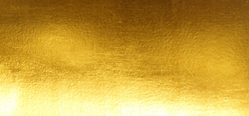 Shiny yellow leaf gold foil texture