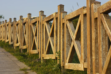 Obraz premium Wooden railing in the park in Antalya Turkey
