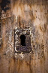 Old aged keyhole on the wooden door in Antalya Turkey