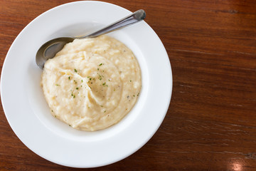 mashed potato with a spoon