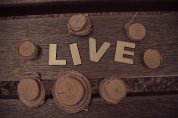 word live made with wooden letters. Wooden illustration blackground - 167663416
