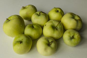 Vegan Food. Young green apples. Isolated on white background