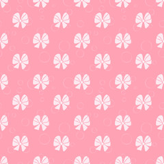 Cute pink background with bows. Seamless pattern.