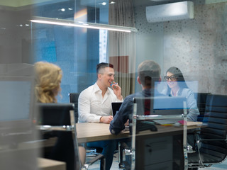 Startup Business Team At A Meeting at modern office building