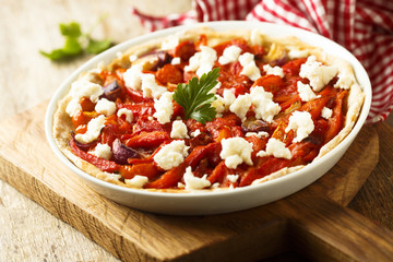 Grilled bell pepper. tomato and goat cheese tart