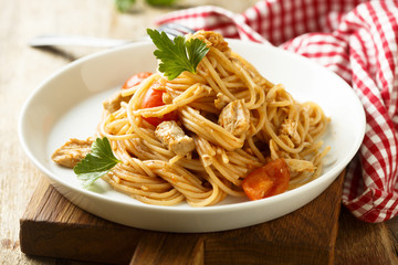 Pasta with chicken and tomato sauce