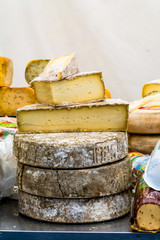 Close Up View of French Cheese on Traditional Market Stall