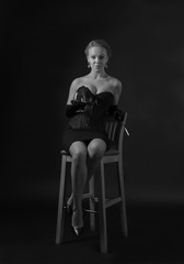 Fototapeta premium Young beautiful woman with glass of brandy.