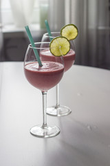 Fresh strawberry party coctails with lime