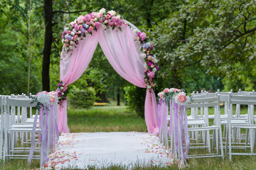 Pink wedding altar arch decoration in the garden