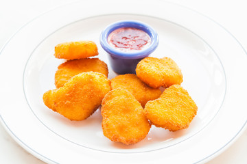 Cheese nuggets in a white plate
