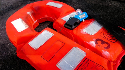 A life vest from a commercial ship, used by a refugee crossing the Mediterranean