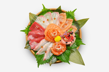 Japanese food raw fish mixed sashimi in brown wooden bowl (maguro, otoro, salmon, sea bass,...