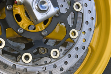 Obraz na płótnie Canvas Brake disc on the wheel of sports motocycles