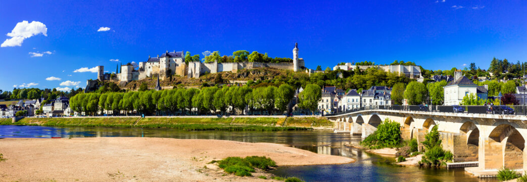 Landmarks of France - panoramic view of Chinon with royal castle. Loire valley river
