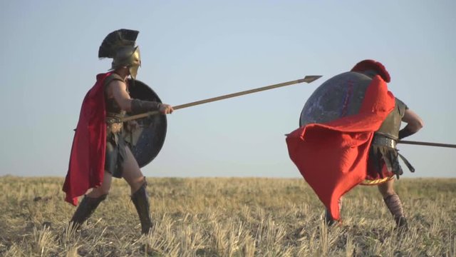 The Roman warrior unusually attacks his opponent with a spear, slow motion