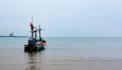 Native small fishing boats on the beach .