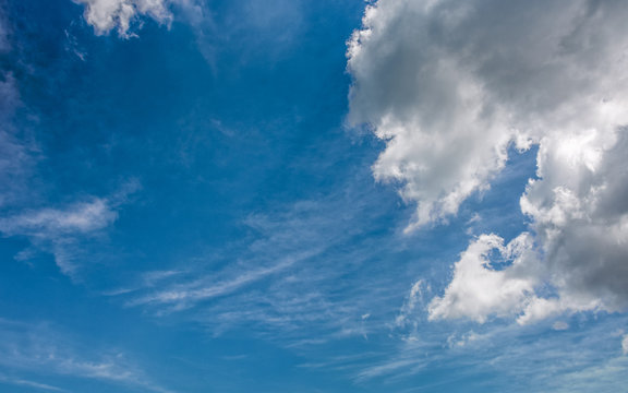 grey cloud on a blue summer sky