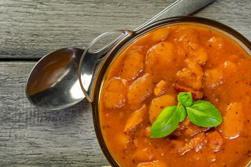 Stewed beans in tomato sauce.
