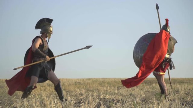 The gladiator repels the enemy by kicking the shield, slow motion