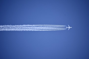 A jet plane leaving a condensation trail