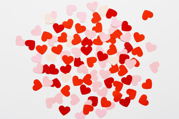 Valentines day background with pink and red hearts