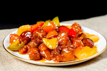 wok fried chicken stir fry with sweet peppers and chinese vegetables