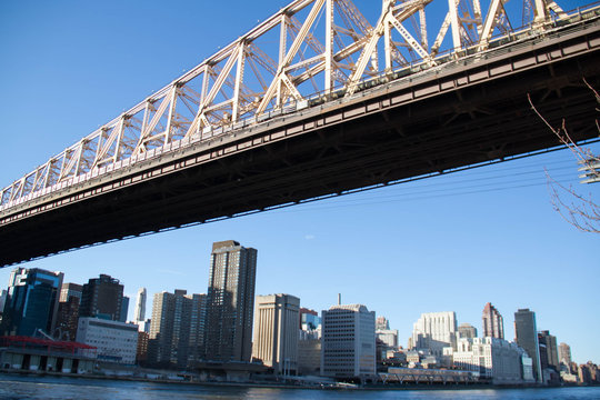 Queensboro bridge over East river and Manhattan with clearly blue sky