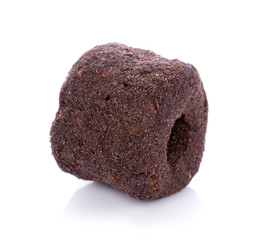 Crunchy corn chocolate snacks on a white background