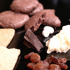 Almond biscuits, raisins, dark chocolate and parmesan cheese.
