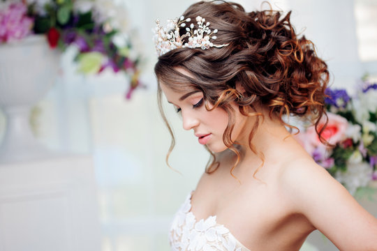 Portrait of beautiful bride in wedding dress
