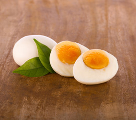 boiled eggs on wooden cutting board