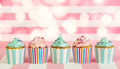 Cupcakes with pink, white and blue icing 