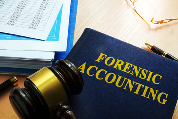 Book with title forensic accounting on a table.