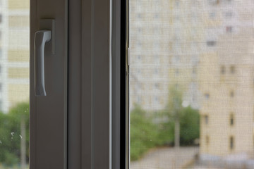 Open window with a mosquito screen to prevent insects and bugs, like flies, bees, mosquitoes or wasps from entering