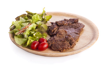 grilled meat : beef ( lamb ) garnished with tomatoes ,tomatoes