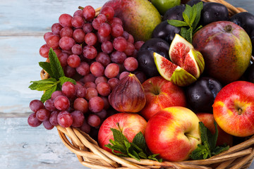 Naklejka na ściany i meble Basket of fresh organic fruits