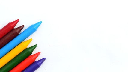 Pure crayons isolated on white background.