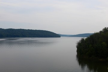 The curve in the big lake on a foggy cloudy morning.