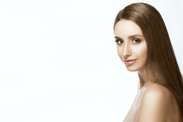 Fototapeta premium Beautiful young woman with long hair on white background with place for your text
