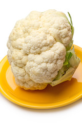 Cauliflower on a yellow plate