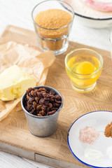 Baking ingredients for pastry on white wooden rustic table. Step by step recipe. 