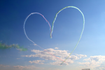 Multicolored smoke in the sky.