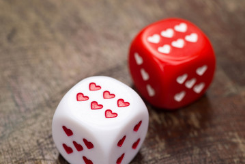 two dices with hearts