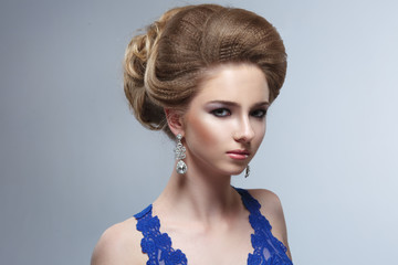 Beauty portrait of a beautiful girl with an elegant hairstyle.